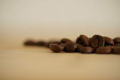 Close-up of coffee beans against white background