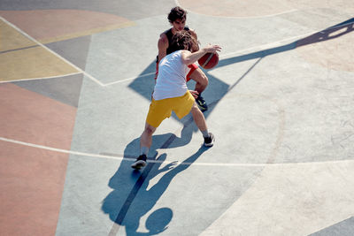 High angle view of people walking on street