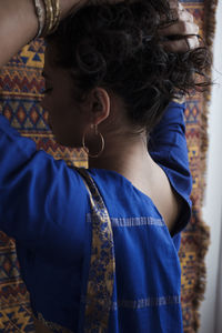 Rear view of girl standing outdoors