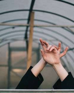 High angle view of woman hand on table