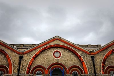 Low angle view of old building against sky