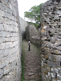 Full length of woman on wall