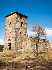 Low angle view of old building against sky