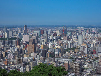 High angle view of buildings against sky in city