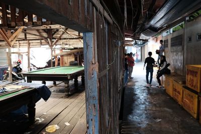 People in corridor of building