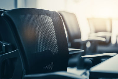 Close-up of empty seats on table