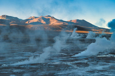 Scenic view of volcanic mountain against sky