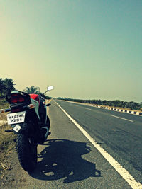 Road against clear sky