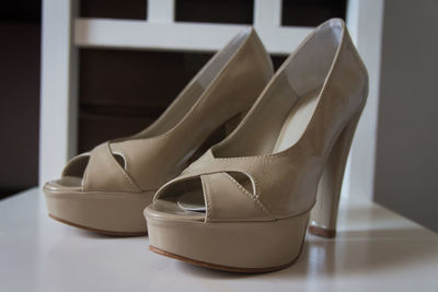 Close-up of shoes on table