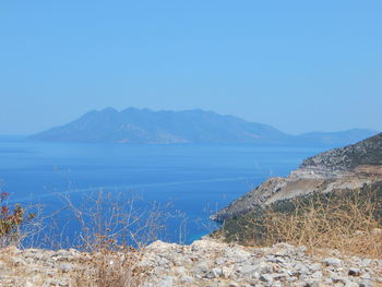 Scenic view of calm sea against clear sky