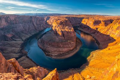 Panoramic view of rock formations against sky