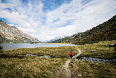 Girl hiking near a lake