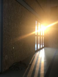 Sunlight streaming through window at sunset