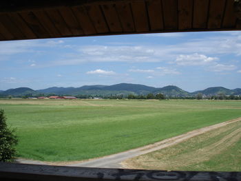 Scenic view of field against sky