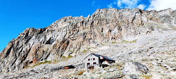 Panoramic view of rocky mountains against sky