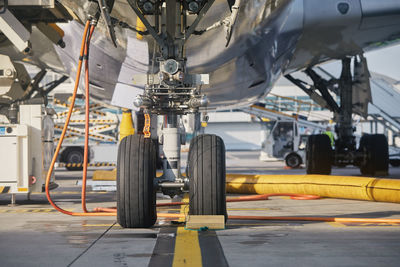 Low angle view of airplane. ground service at airport. preparation plane before flight.