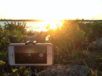 Scenic view of landscape at sunset