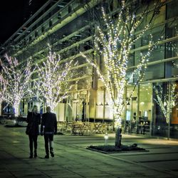 View of illuminated city at night