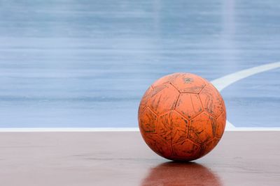Close-up of soccer ball on court