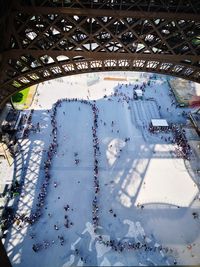 High angle view of people below eiffel tower