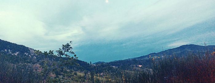 Scenic view of mountains against sky