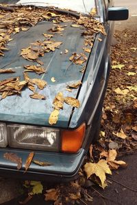 Close-up of abandoned car during autumn