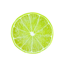 Close-up of lemon slice against white background