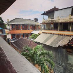 Houses and buildings against sky