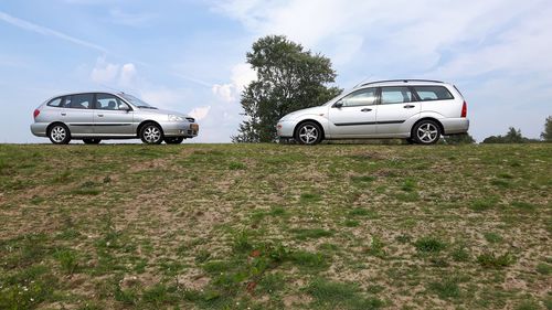 Car on mountain against sky