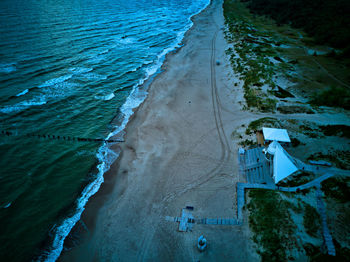 High angle view of beach by sea