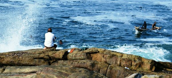 People on sea shore