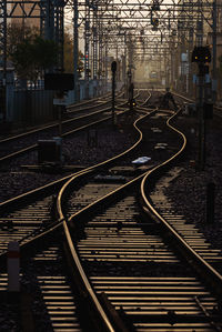 High angle view of railroad tracks by street in city