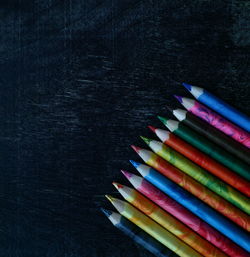 High angle view of colored pencils on table
