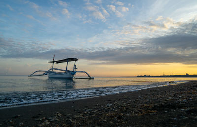 Fisherman traditional boats at lovina beach, bali, indonesia.