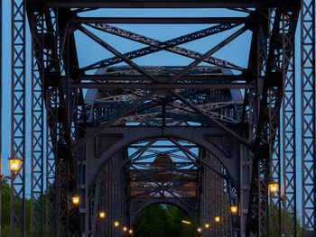 Low angle view of illuminated bridge