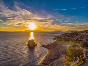 Scenic view of sea against sky during sunset