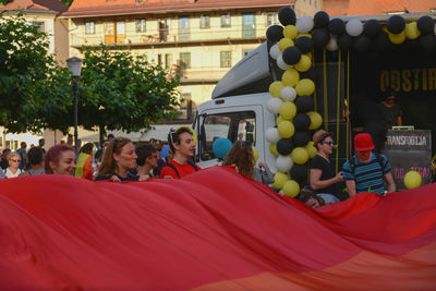 People at music concert in city