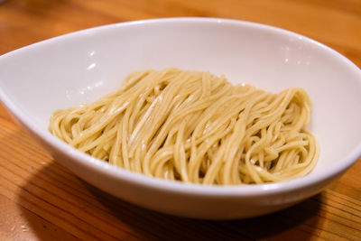 Close-up of noodles in plate on table