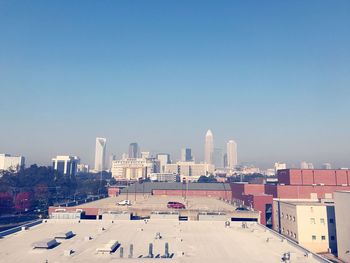 Cityscape against clear sky