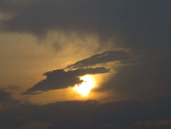 Low angle view of dramatic sky during sunset