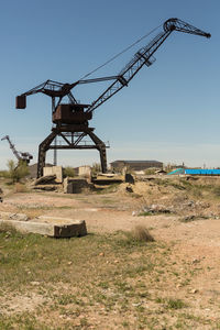 Construction site on field against sky