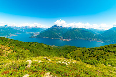 View of lake como, looking north, from santa maria rezzonico, with alps, villages and mountains.