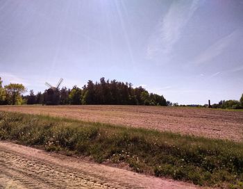 Scenic view of field against clear sky