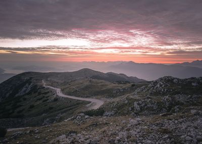 Scenic view of landscape against sky during sunset