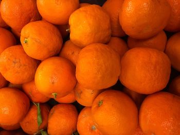 Full frame shot of oranges at market stall