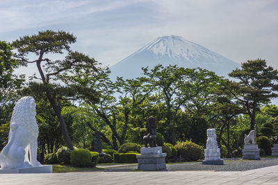 View of statue against trees