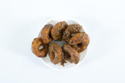 Close-up of cake against white background