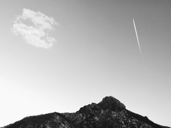 Low angle view of vapor trail against sky