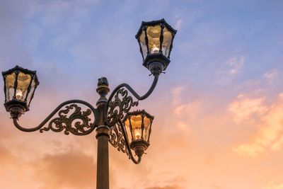 Low angle view of street light against sky