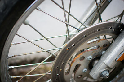 Close-up of motorbike wheel